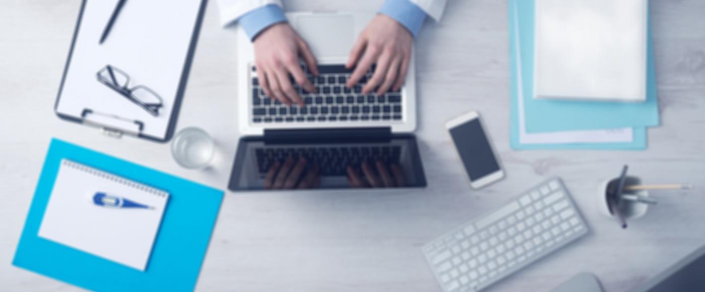 Health worker using computer