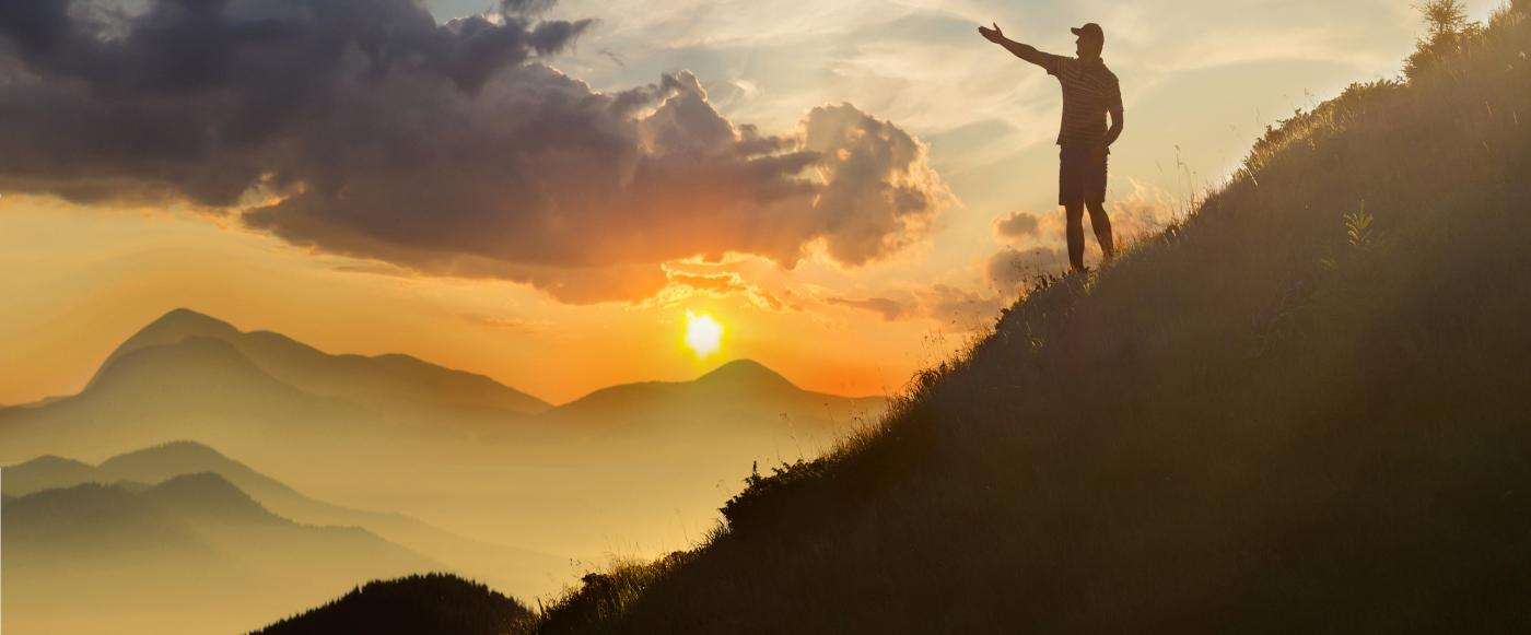 Mental health-silhouette man on hill