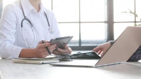 Female doctor on laptop