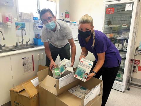 Dr Konrad Kangru (left) and a Whitsunday Doctors Service nurse receives PPE